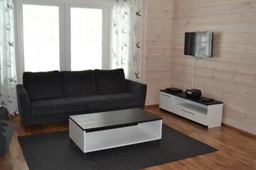 Фото номера Коттедж Делюкс с двумя спальнями Курортные отели Ruoke Holiday Village г. Кесялахти 48