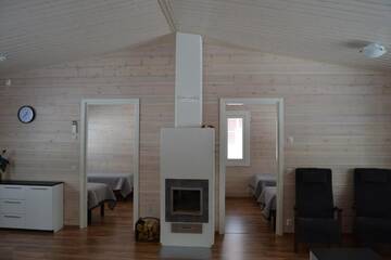 Фото номера Коттедж Делюкс с двумя спальнями Курортные отели Ruoke Holiday Village г. Кесялахти 46