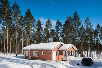 Фото номера Коттедж Делюкс с двумя спальнями Курортные отели Ruoke Holiday Village г. Кесялахти 18