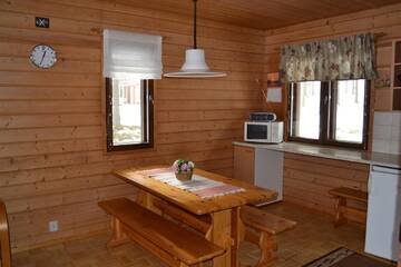 Фото номера Улучшенный коттедж с 2 спальнями Курортные отели Ruoke Holiday Village г. Кесялахти 7
