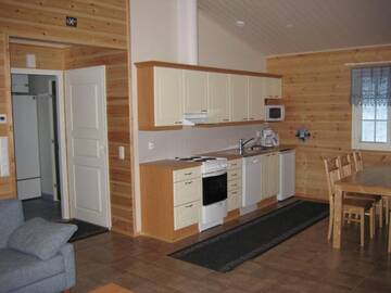 Фото номера Коттедж Делюкс с двумя спальнями Курортные отели Ruoke Holiday Village г. Кесялахти 31