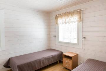 Фото номера Коттедж Делюкс с двумя спальнями Курортные отели Ruoke Holiday Village г. Кесялахти 28