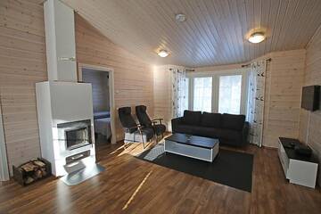 Фото номера Коттедж Делюкс с двумя спальнями Курортные отели Ruoke Holiday Village г. Кесялахти 33