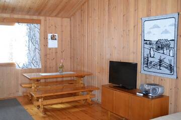 Фото номера Стандартный коттедж с одной спальней Курортные отели Ruoke Holiday Village г. Кесялахти 4