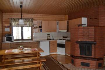 Фото номера Улучшенный коттедж с 2 спальнями Курортные отели Ruoke Holiday Village г. Кесялахти 4