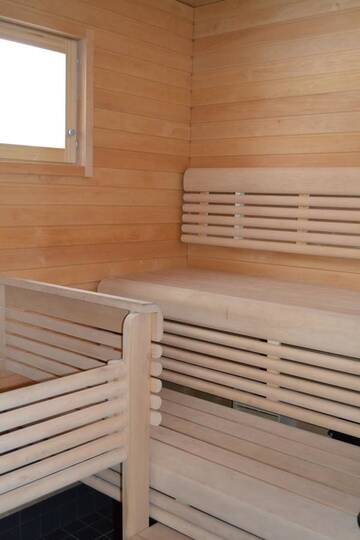 Фото номера Коттедж Делюкс с двумя спальнями Курортные отели Ruoke Holiday Village г. Кесялахти 8