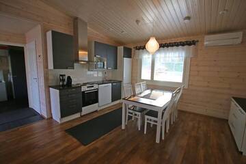 Фото номера Коттедж Делюкс с двумя спальнями Курортные отели Ruoke Holiday Village г. Кесялахти 42