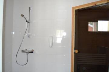 Фото номера Коттедж Делюкс с двумя спальнями Курортные отели Ruoke Holiday Village г. Кесялахти 9
